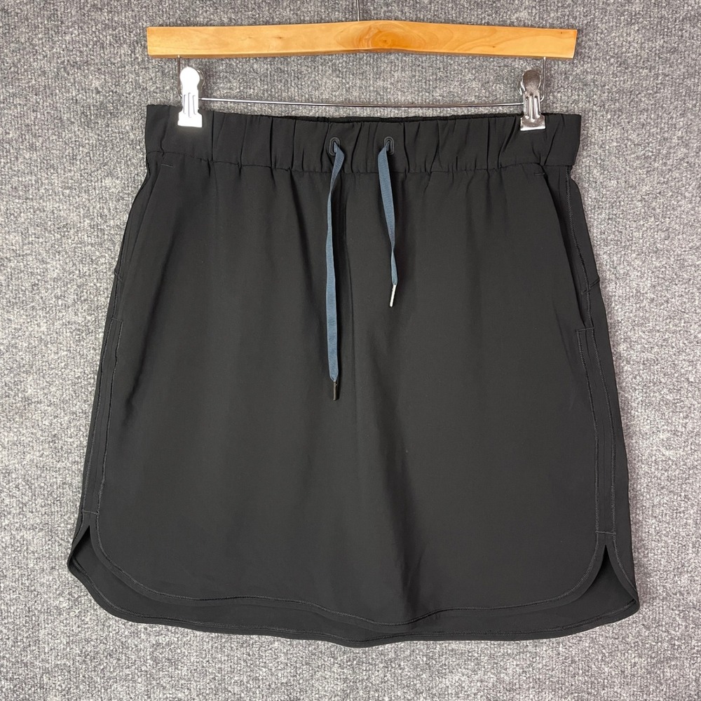 Lululemon On the Fly Skirt Womens 12 Black Drawstring Pockets